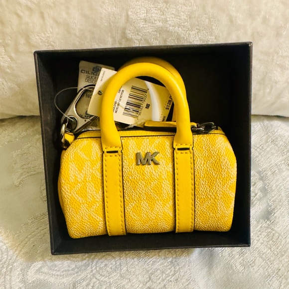 Michael Kors Handbags - Michael Kors Vibrant Yellow Mini Bag key charm